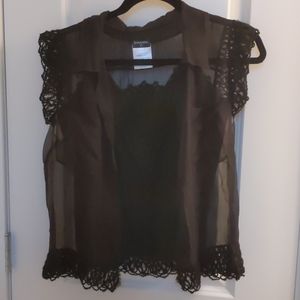 Chanel black lace, knit, and sheer outfit